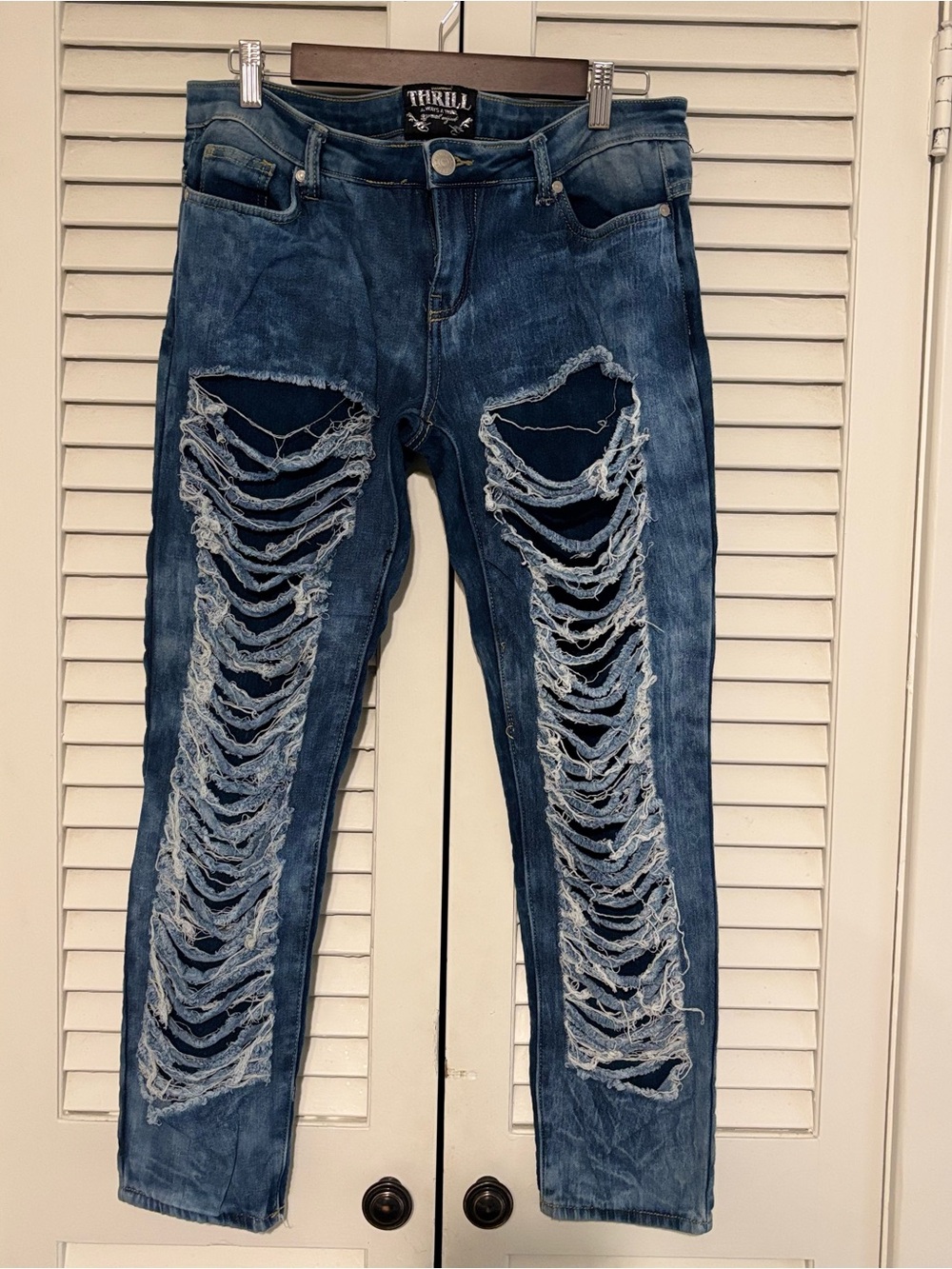 Thrill woman’s Distressed Ripped Dark Blue Jeans